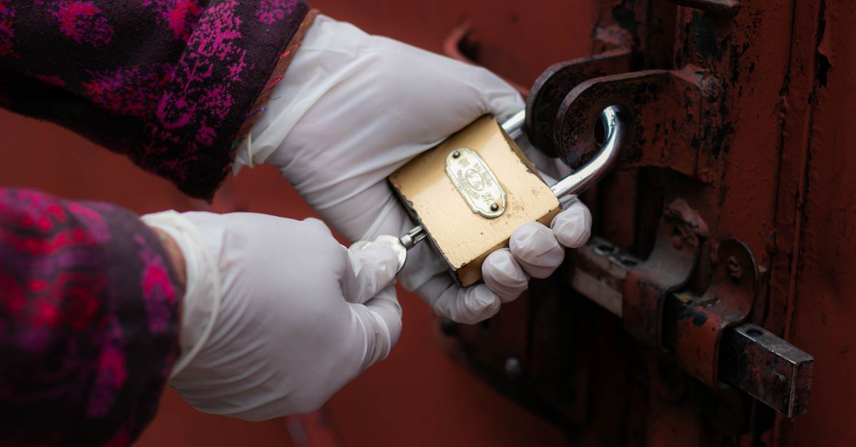locksmith unlocking front door — Cranford Locksmith Inc